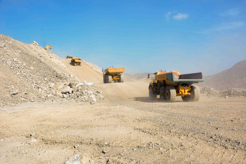 Properly loaded articulated dump truck for safe operation.